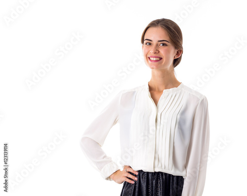 Smiling woman wearing blouse and skirt