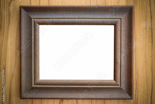 Wood picture frame blank on wood background.