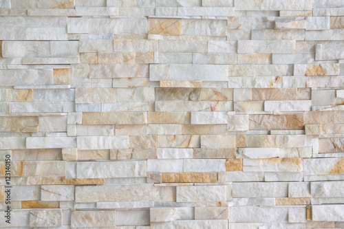 Pattern of grey and rough sandstone wall texture and background, stone Cladding wall
