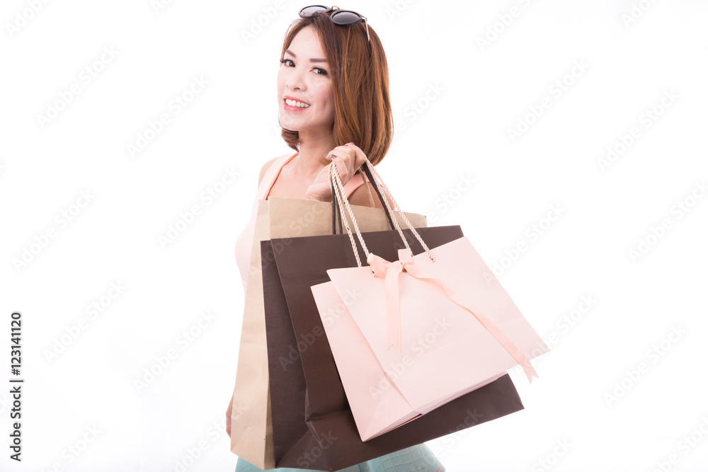 Asian girl enjoy shopping with shopping bag isolate on white background Asian girl enjoy shopping with shopping bag isolate on white background