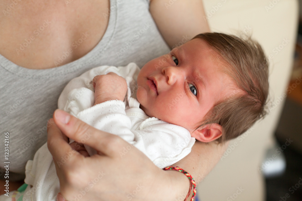 Woman holding little baby