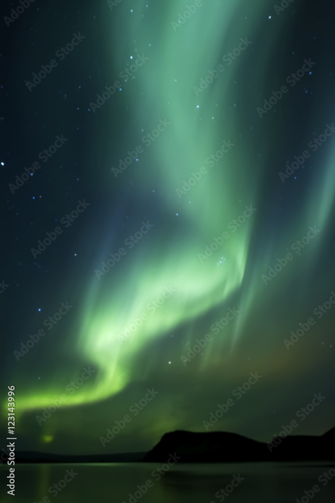 Aurora Borealis beautiful northern light in the clear night sky,  Iceland