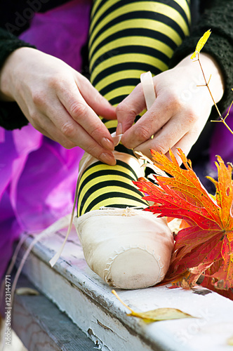 Tying ballet shoes photo