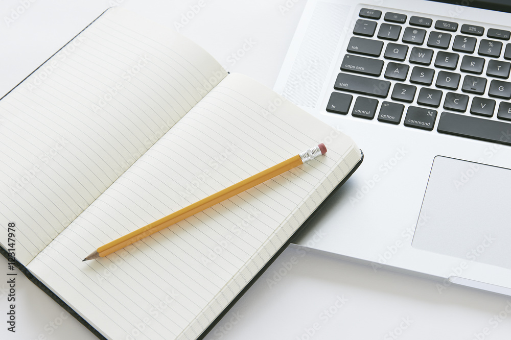 Laptop computer, with blank notepad and pencil Laptop computer, with blank notepad and pencil