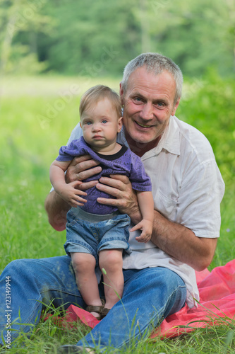 An elderly man with a child © jura
