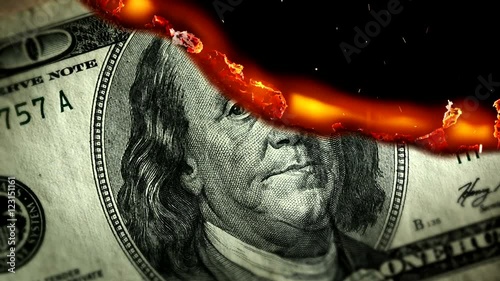 Dollar bill USA money burning in flames