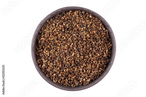 Decorticated cardamom seeds in a bowl