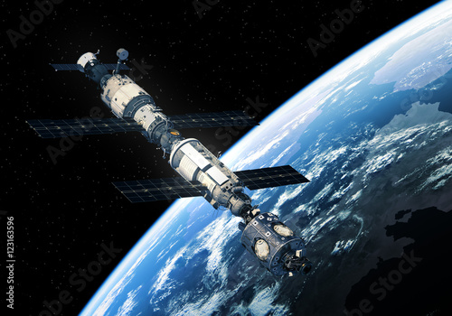 Fototapeta Naklejka Na Ścianę i Meble -  International Space Station Orbiting Earth