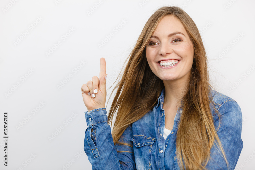 Cheerful young lady is smiling. Cheerful young lady is smiling.