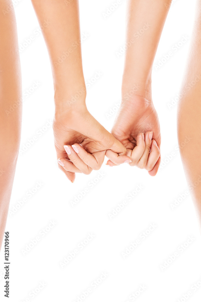 Hands of woman holding together Hands of woman holding together