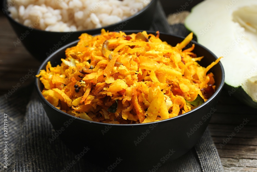 Papaya stir fry with turmeric, selective focus Papaya stir fry with turmeric, selective focus