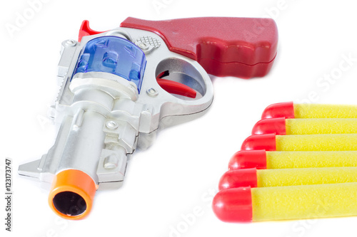 Toy gun isolated on white background.