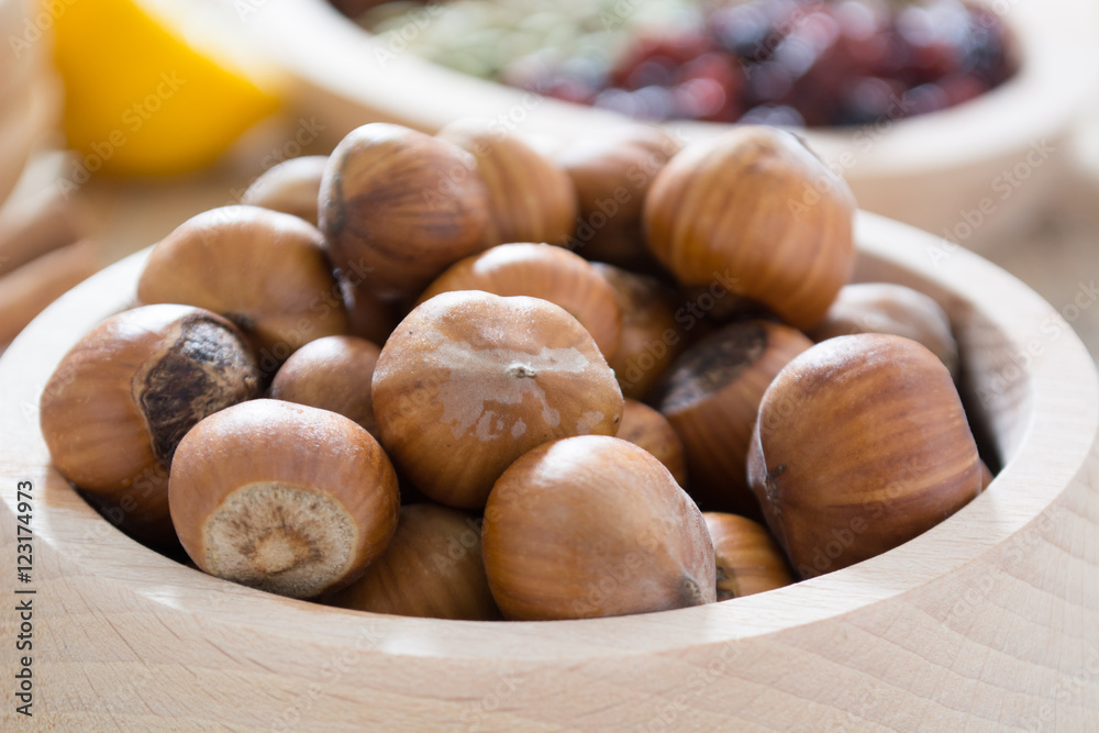 Hazelnuts in wooden bowl