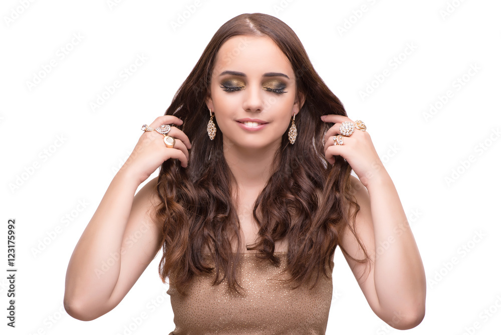 Fototapeta premium Young woman showing off her jewellery isolated on white