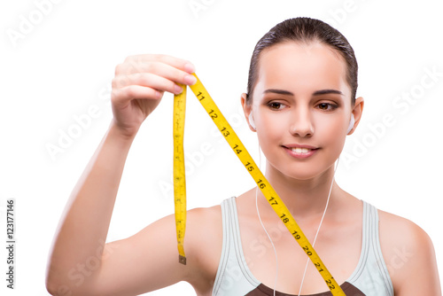 Young woman with centimeter in diet concept