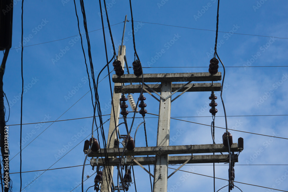 electrical post by the road with power line cables, transformers electrical post by the road with power line cables, transformers