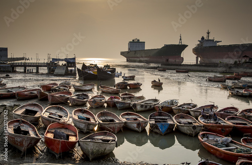 boats in a shipbreaking yard in Bangladesh photo