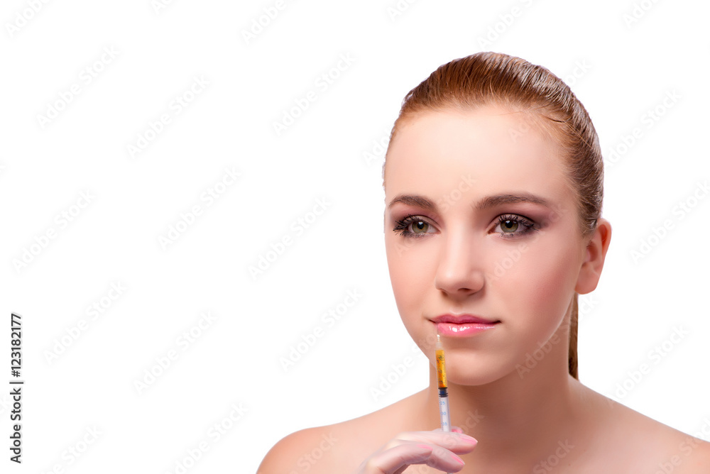 Young woman preparing for facial treatment isolated on white Young woman preparing for facial treatment isolated on white