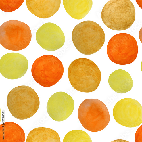 Seamless spotty pattern of watercolor stains in shades of orange, yellow & ochre brown. Retro dotty ornament of hand painted oval shapes in mid-century modern style.