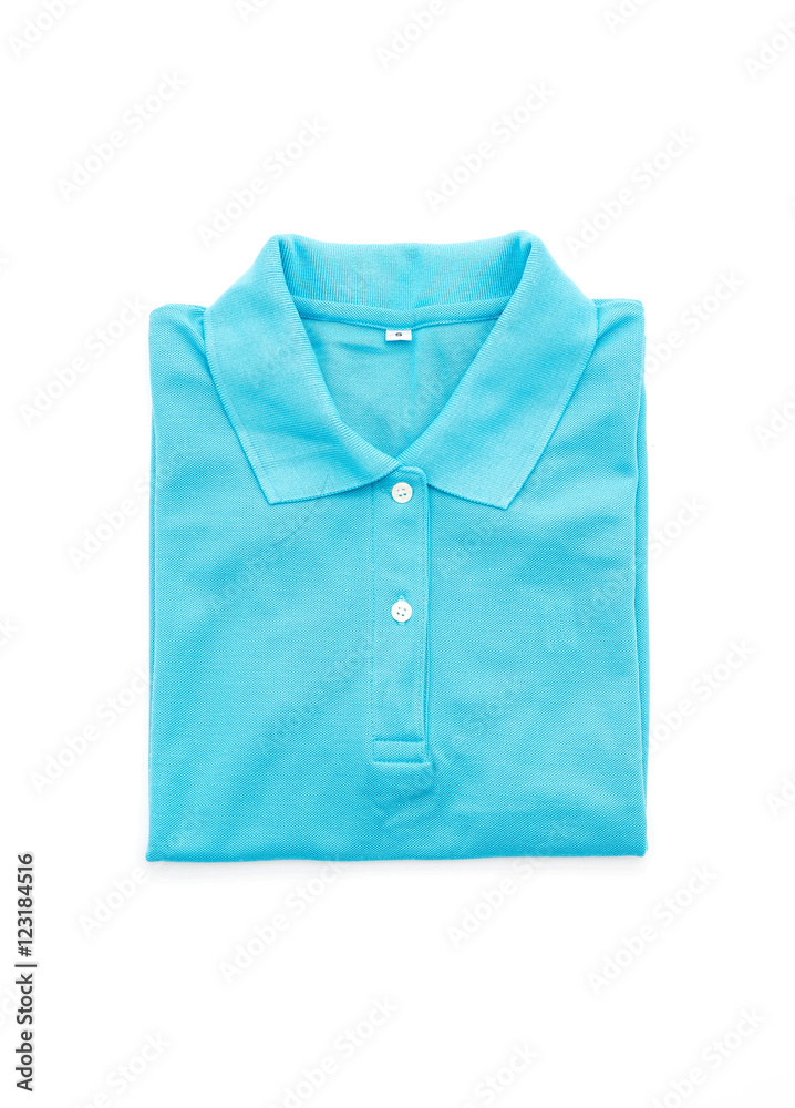 blue shirt. folded t-shirt on white blue shirt. folded t-shirt on white