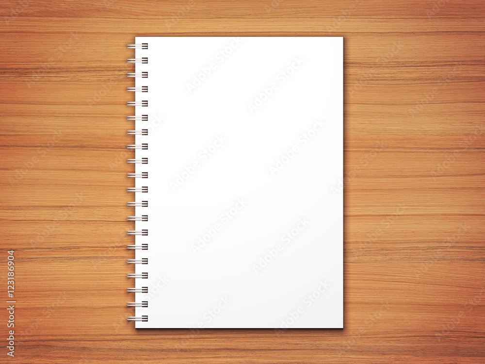 White 3d render blank spiral notepad on wooden desk texture. White 3d render blank spiral notepad on wooden desk texture.