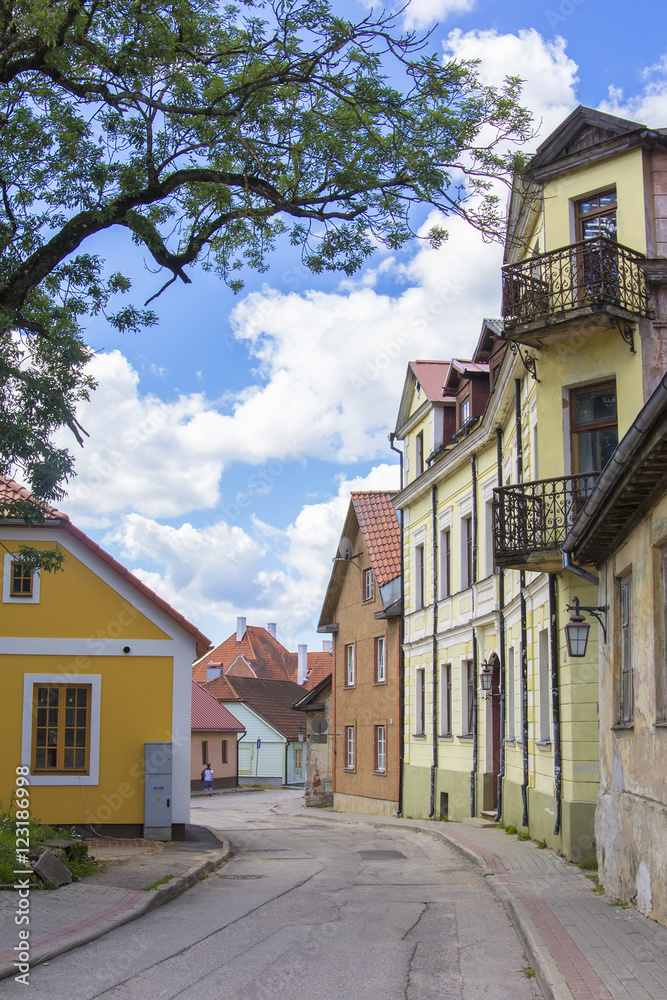 background landscape view of old streets with wooden houses in the town of Cesis, Latvia