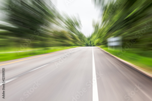driving high speed in asphalt road, motion blur effect