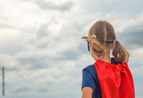 Платно Superhero kid looking into distance.