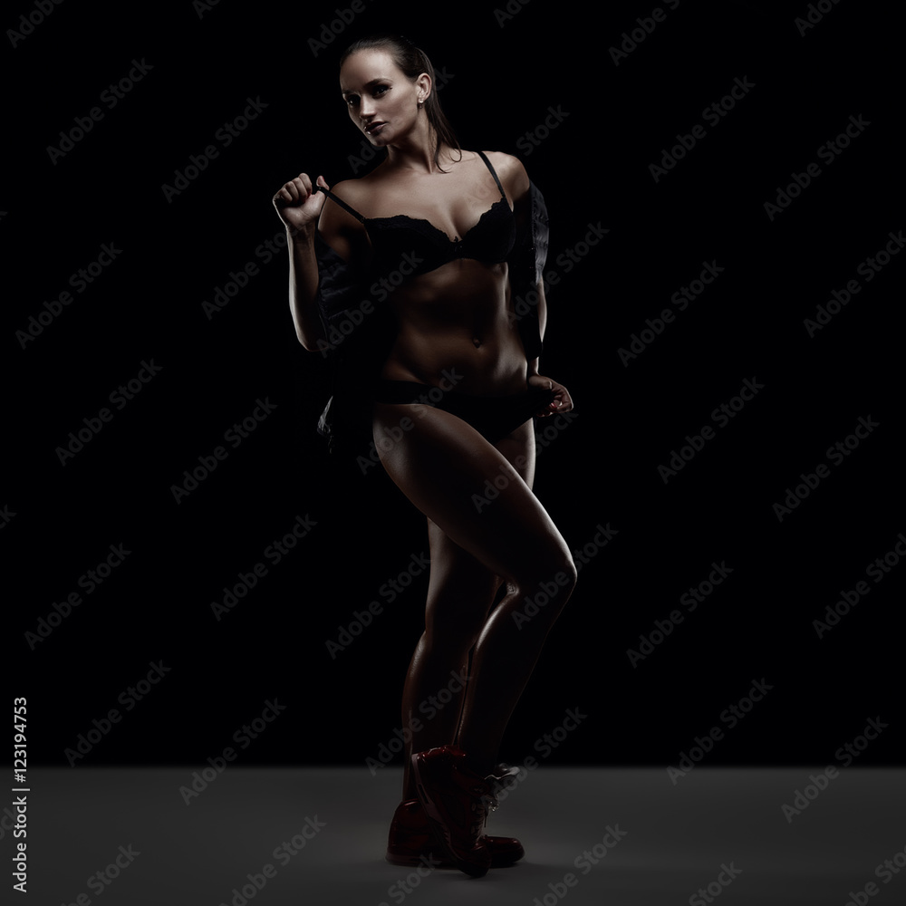 Fototapeta premium Fitness girl in studio