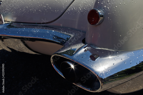 chrome exhaust pipe in a retro car