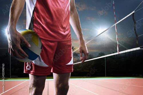 Obraz Profesjonalny siatkarz z bliska na nocnym korcie