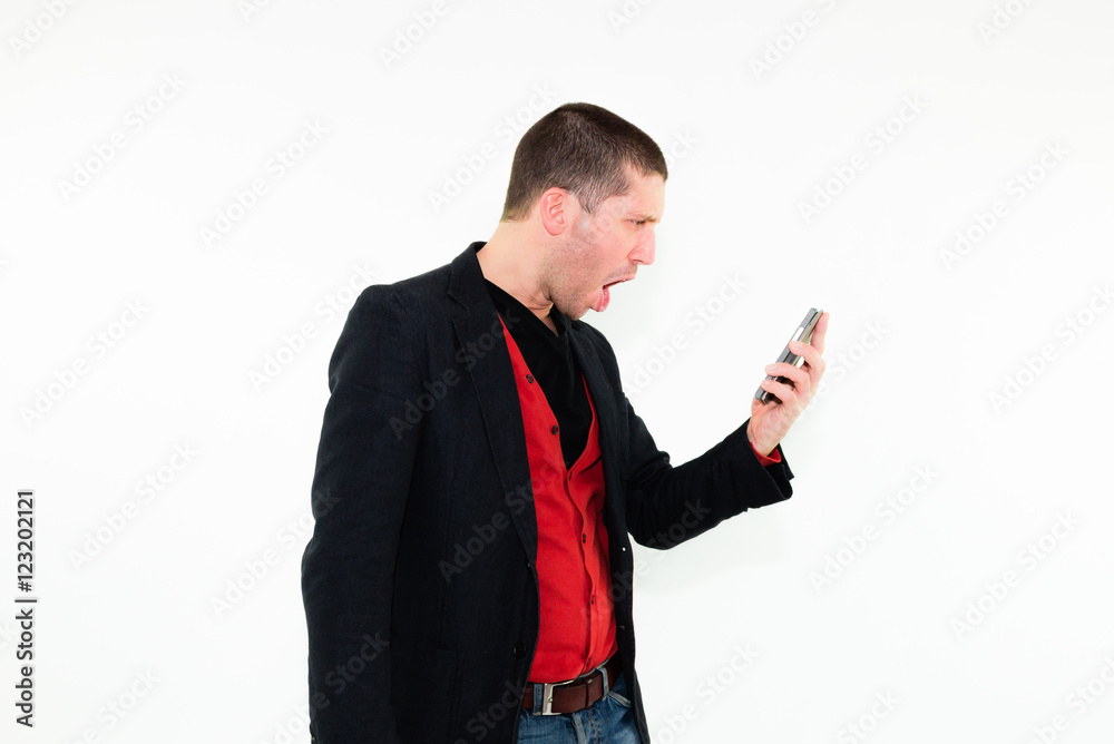 Caucasian angry business man screaming on mobile phone Caucasian angry business man screaming on mobile phone