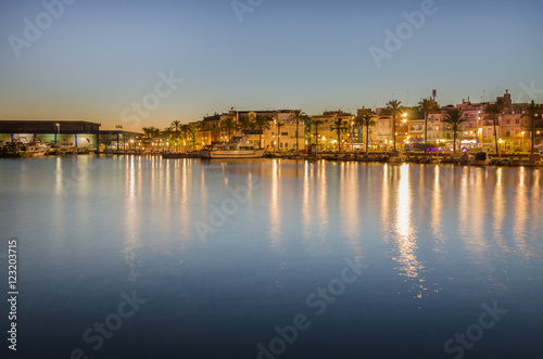 Quay of port in Tarragona in sunset light  Spain