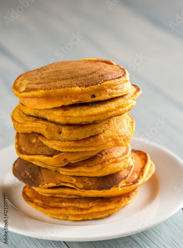 Stack of pumpkin pancakes on the plate