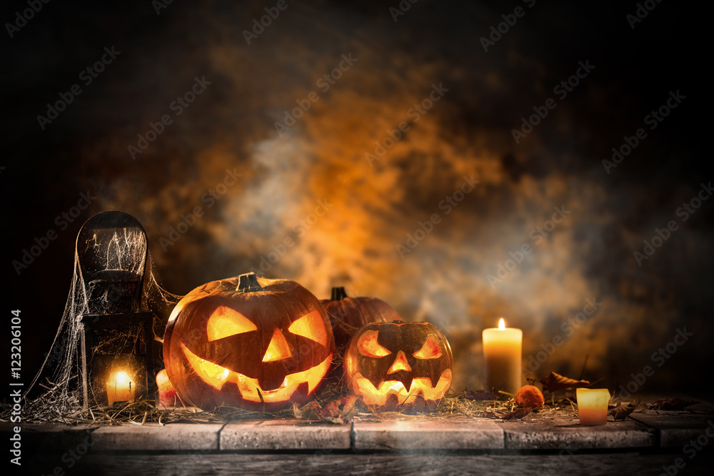 Fototapeta premium Halloween Pumpkins on old wooden table