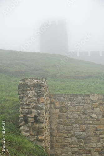 Walls and tower of Kalemegdan fortress covered in fog  Belgrade  Serbia