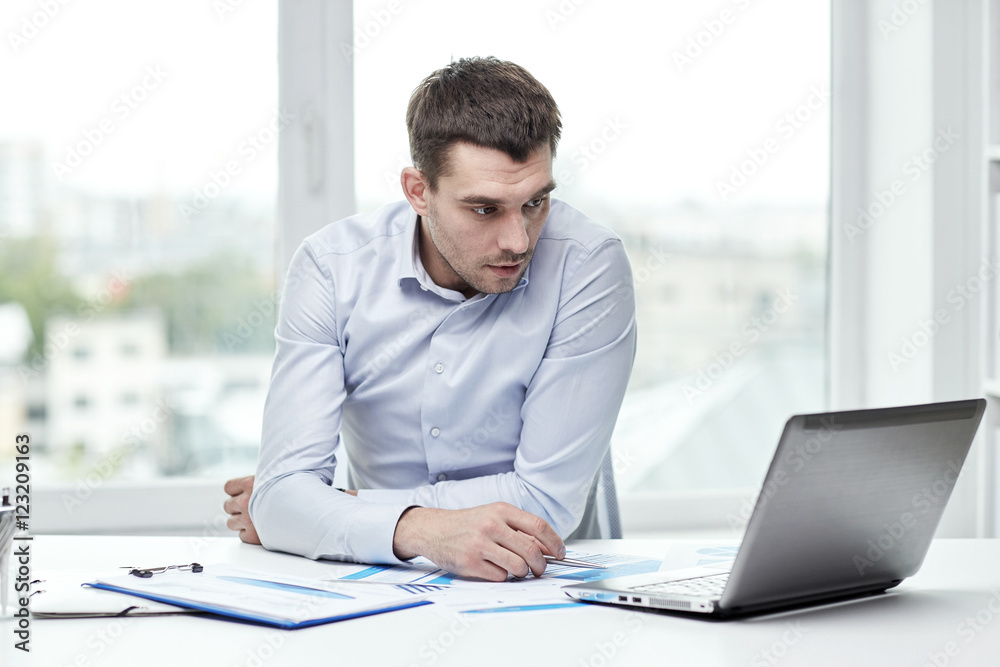 stressed businessman with laptop at office stressed businessman with laptop at office