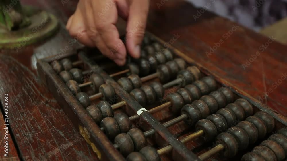 chinese abacus is a calculating tool used primarily in parts of Asia for performing arithmetic processes. The abacus was in use centuries before the adoption of the written modern numeral system.