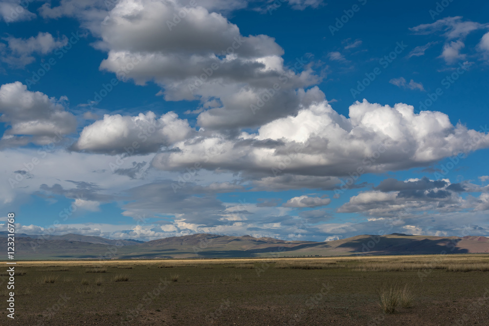 mountains steppe sky clouds