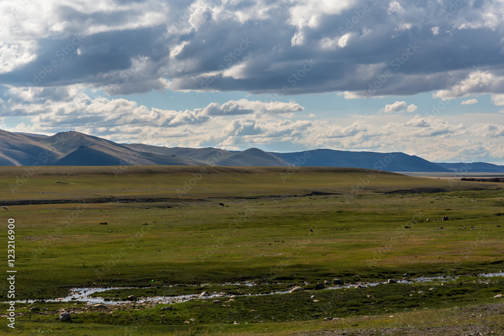 mountains steppe sky clouds