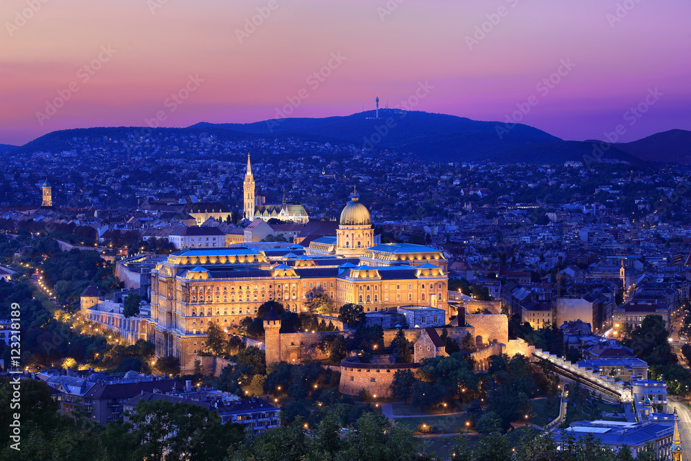 The illuminated Royal Palace at sunset in Budapest, Hungary