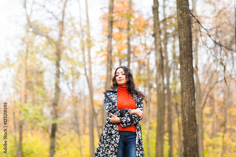 Street fashion concept - closeup portrait of a pretty girl. Beautiful autumn woman. Street fashion concept - closeup portrait of a pretty girl. Beautiful autumn woman.