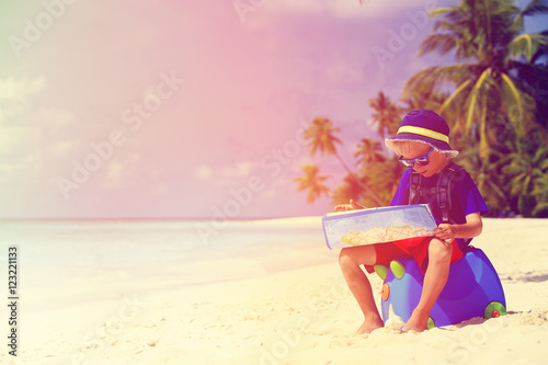 little boy travel on summer tropical beach