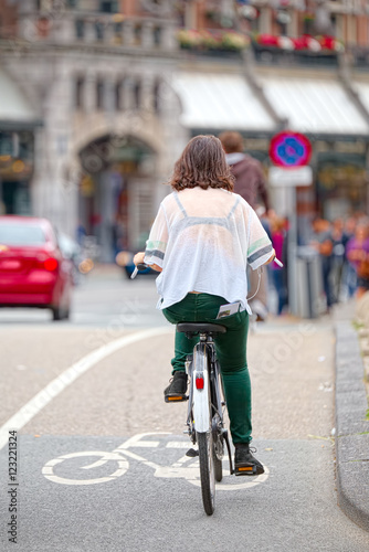 Girl on bicycle in Amsterdam