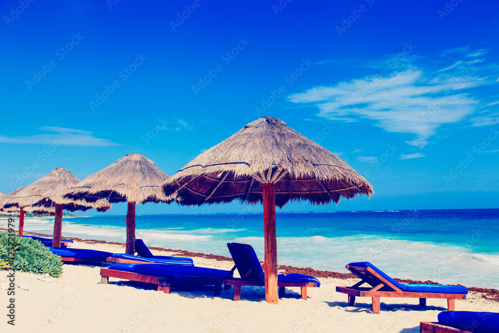 chairs on exotic tropical white sand beach