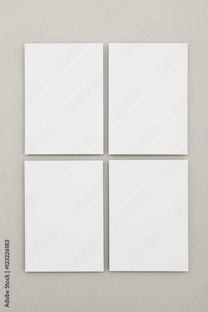 Blank white postcard flyer on a grey backgound Blank white postcard flyer on a grey backgound