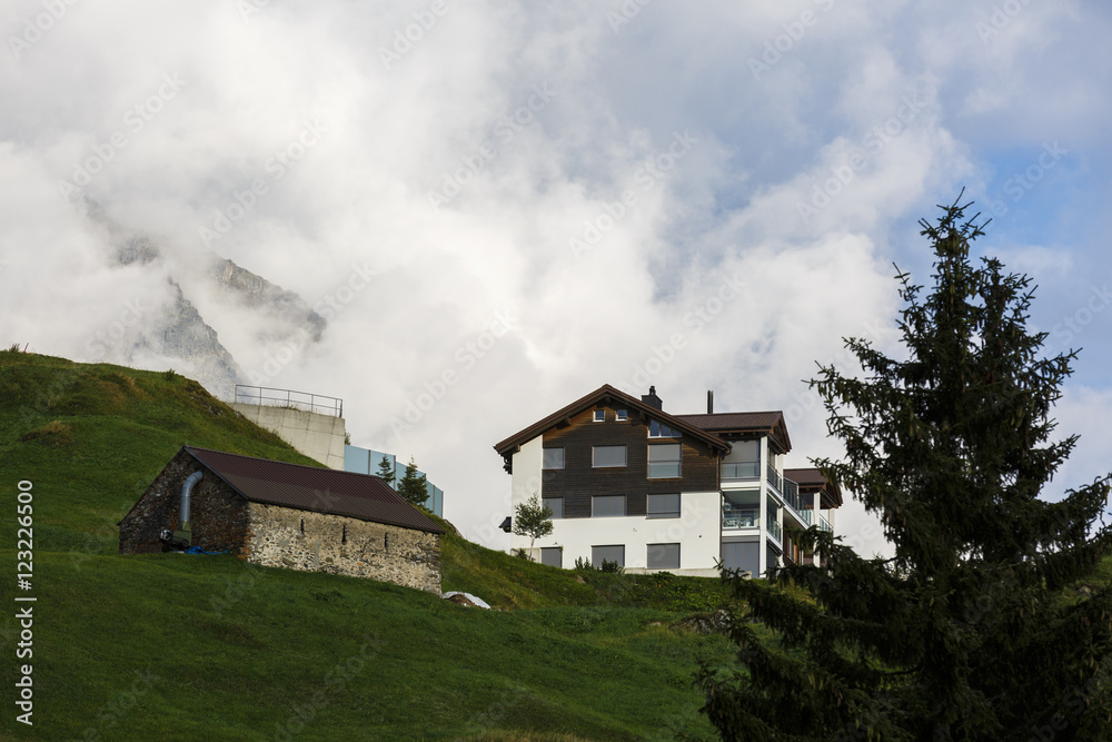 Idyllic summer landscape in the Alps with fresh green mountain Idyllic summer landscape in the Alps with fresh green mountain