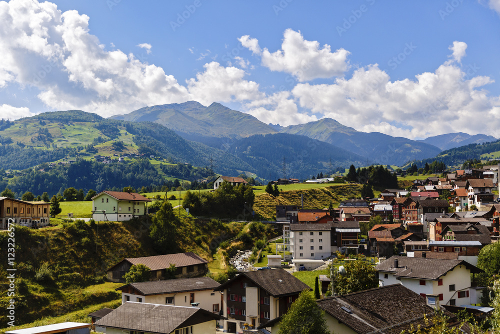 Fototapeta premium Idyllic summer landscape in the Alps with fresh green mountain