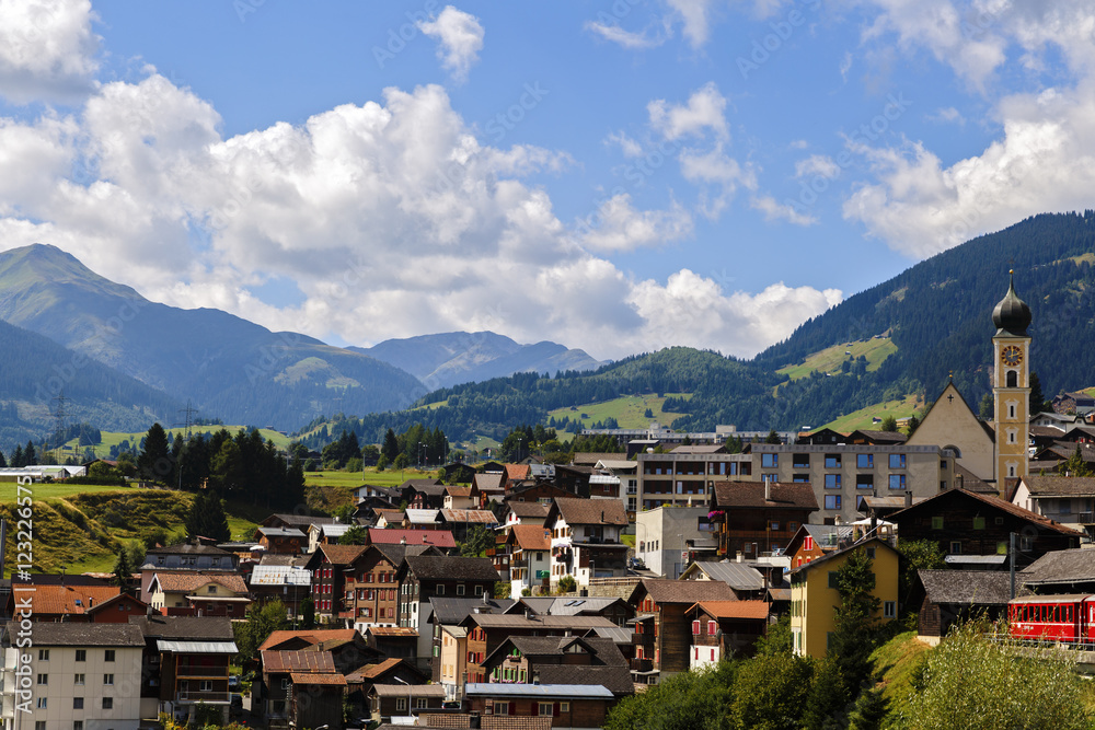 Idyllic summer landscape in the Alps with fresh green mountain