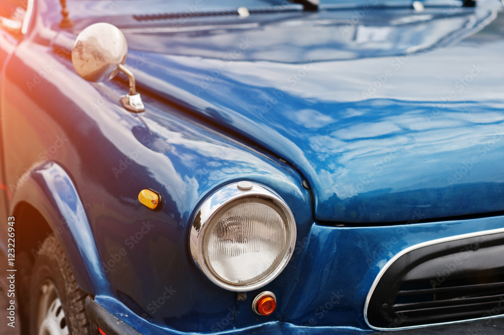 Fototapeta premium Retro car headlight. Front of old vintage car